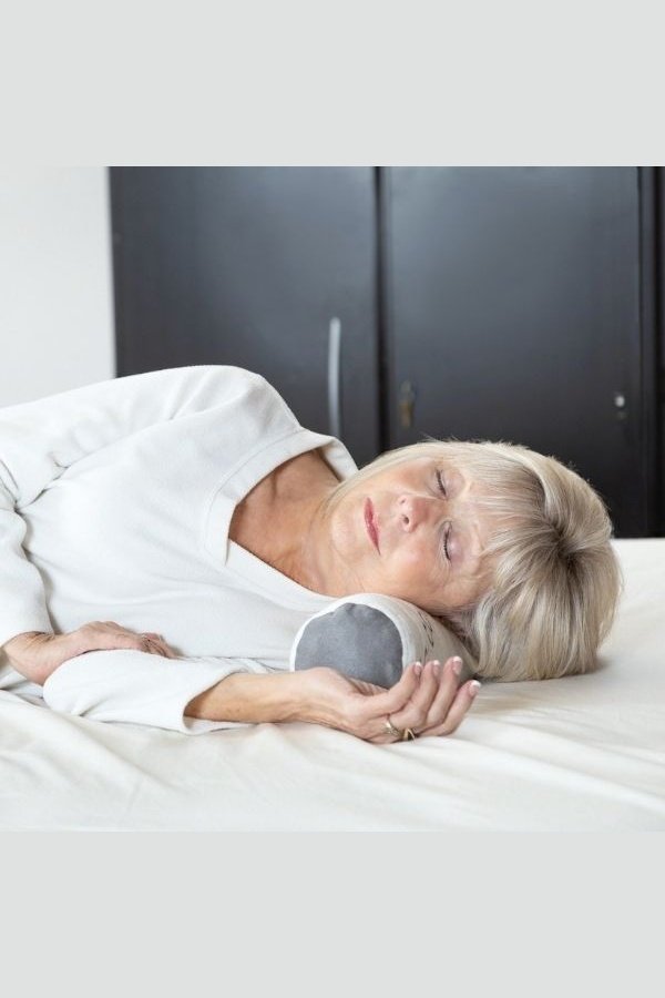 Rolled pillow under on sale neck